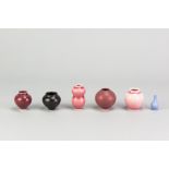 YUTA SEGAWA (born 1988); a collection of six miniature porcelain vases covered in different