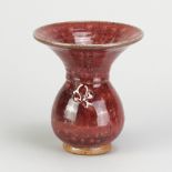 ADRIAN LEWIS-EVANS (1927-2021); a stoneware vase with flared rim covered in copper red glaze with