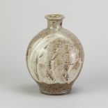 PHIL ROGERS (1951-2020); a salt glazed bottle partially covered in brushed slip with incised