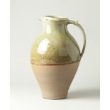 TOM KNOWLES JACKSON (born 1973); a large stoneware jug partially covered in green ash glaze with