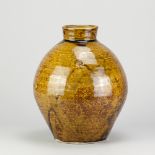 WILLIAM MARSHALL (1923-2007) for Leach Pottery; a porcelain bottle covered mottled iron and green