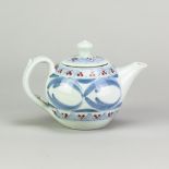 DEREK EMMS (1929-2004); a small porcelain teapot covered in celadon glaze with cobalt and copper red