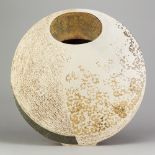BEN ARNUP (born 1954); a large stoneware trompe l'oeil disc form, painted signature and edition