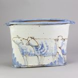 ANDREW McGARVA (born 1956); a stoneware oval twin handled vessel decorated with sheep, painted AM