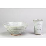 FRANCIS LLOYD JONES; a stoneware bowl covered in speckled grey glaze, impressed mark, diameter 19cm,