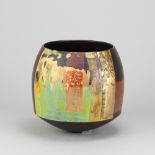 TONY LAVERICK (born 1961); a black porcelain vessel covered in blocks of different colours and