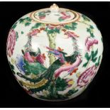 A late 19th century Chinese Famille Rose jar and cover of bulbous form decorated in enamels with
