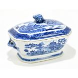 A Chinese Export blue and white tureen and cover, with fruit finial and decorated with buildings