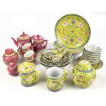 A collection of twenty-four pieces of Chinese Famille Jaune modern ceramics, and a smaller selection