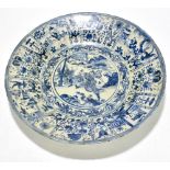 An 18th century Chinese Kraak porcelain blue and white bowl, centrally decorated with a warrior in