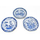 Three 18th century Chinese Export blue and white plates of octagonal form, each decorated with