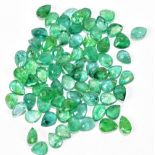 EMERALDS; a group of pear shaped facet cut stones weighing 20ct, each 5mm x 4mm.