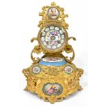 A 19th century French Louis XV gilt metal and Sèvres style porcelain mounted mantel clock, the