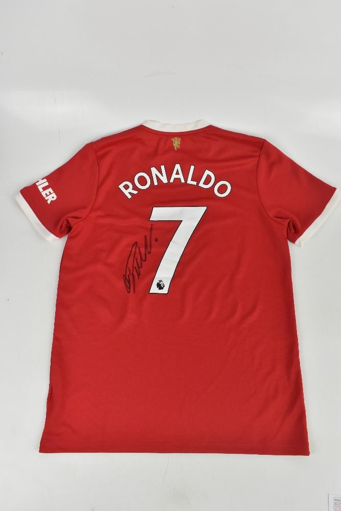 CRISTIANO RONALDO; a Manchester United home shirt, signed to the reverse, size L.Additional - Image 2 of 3