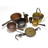 A quantity of brass and copper to include jam pans, jugs and a hanging scale.