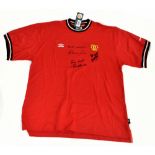 MANCHESTER UNITED; a 2001 T-shirt, signed to the front by George Best, Denis Law and Bobby Charlton,