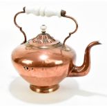 A Victorian copper kettle with white gall handle, height 26cm.
