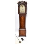 A George III mahogany longcase clock, the swan neck pediment above arched silvered dial with eight