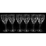 JOHN ROCHA FOR WATERFORD; a part set of five 'Geo' pattern wine glasses, height 20.5cm Additional