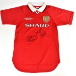 MANCHESTER UNITED; a 1999 Camp Nou retro style shirt, signed to the front Scholes and Giggs, size S.