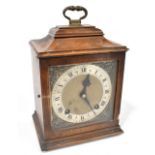 GARRARD; an early 20th century eight day mantel clock, with silvered Roman numeral chapter ring