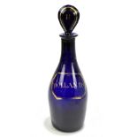 A Georgian Bristol blue glass decanter with dummy stopper and gilded 'Hollands' label, height