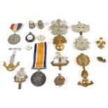 A British WWI War Medal, awarded to 37589.1.A.M J.Woodhall. R.A.F., with various army badges.