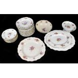 A Continental faience thirty-eight piece part dinner service in the 18th century Meissen style,