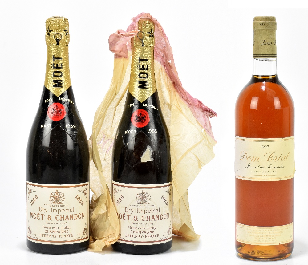 CHAMPAGNE; two bottles of Moet & Chandon Dry Imperial Finest Extra Quality Champagne, 1955 and 1959,