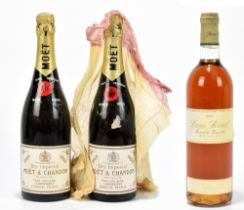 CHAMPAGNE; two bottles of Moet & Chandon Dry Imperial Finest Extra Quality Champagne, 1955 and 1959,