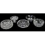 ORREFORS; a contemporary clear art glass bowl, diameter 24cm, together with three cut glass bowls