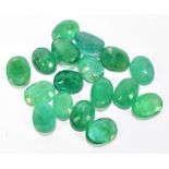 EMERALDS; a group of oval facet cut stones totalling 19.62ct, each 8mm x 6mm.