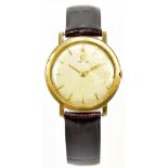 OMEGA; a gentleman's gold plated and steel backed wristwatch, the silver dial set with batons,