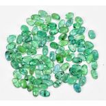 EMERALDS; a group of oval facet cut stones weighing 20ct, each 5mm x 3mm.