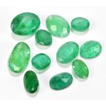 EMERALDS; a group of oval facet cut stones totalling 20.30ct.