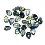 GREEN SAPPHIRE; a group of pear shaped facet cut stones weighing 13.22ct, each 6mm x 4mm.