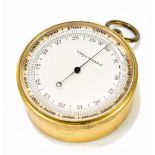 *****WITHDRAWN***** An early 20th century gilt metal cased pocket aneroid barometer with silvered