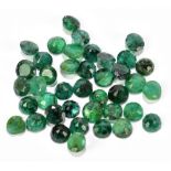 EMERALDS; a group of octagon facet cut stones weighing 33ct, each 6mm.