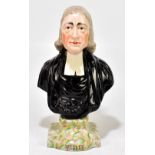 A 19th century Staffordshire bust John Wesley, on painted faux marble base, height 29cm.Additional