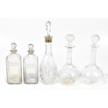 Two similar square section 19th century glass decanters both with etching naming 'Brandy' & 'Rum', a