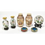 A pair of Japanese Satsuma vases, decorated with figures in gardens, height 18cm, with a pair of