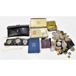 A quantity of coins and bank notes, including commemoratives.