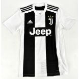 CRISTIANO RONALDO; a 2018 Juventus home shirt, signed to the reverse, size XS.Additional