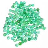 EMERALDS; a group of round facet cut stones weighing 20ct, each 3.25mm.