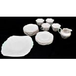 SHELLEY; a 'Dainty' pattern eighteen piece part tea service, in white with pale green handles,