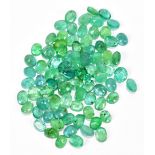 EMERALDS; a group of oval facet cut stones weighing 30ct, each 5mm x 4mm.