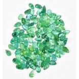 EMERALDS; a group of pear shaped facet cut stones weighing 20ct, each 5mm x 3mm.