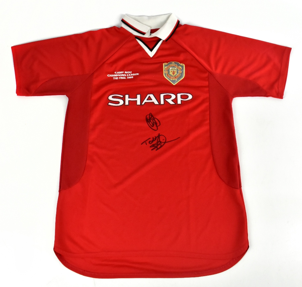 MANCHESTER UNITED; a 1999 Camp Nou retro style shirt, signed to the front by Solskjaer and