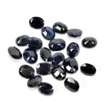 SAPPHIRE; a group of oval facet cut stones weighing 78.17ct, each 10mm x 8mm.