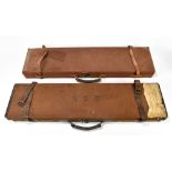 Two canvas shotgun cases, one inscribed 'H.G.G.', 83cm.